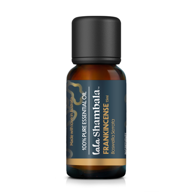 Frankincense Pure Essential Oil in a glass amber bottle with a blue label and golden accents. The Lala Shambala logo is featured at the front.