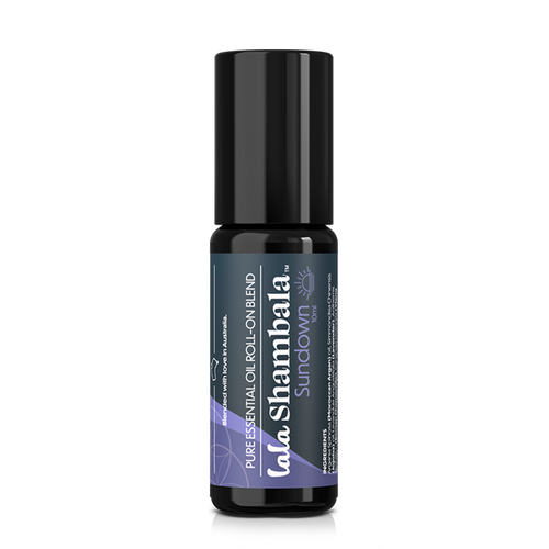 Sundown Pure Essential Oil roll-on in a dark violet Miron glass roller bottle with a blue and purple label featuring the Lala Shambala logo.